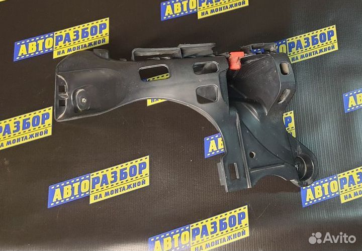 Кронштейн заднего бампера левый Opel Astra