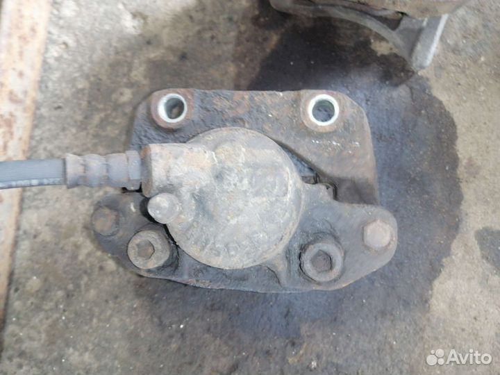 Суппорт тормозной Renault Logan 1