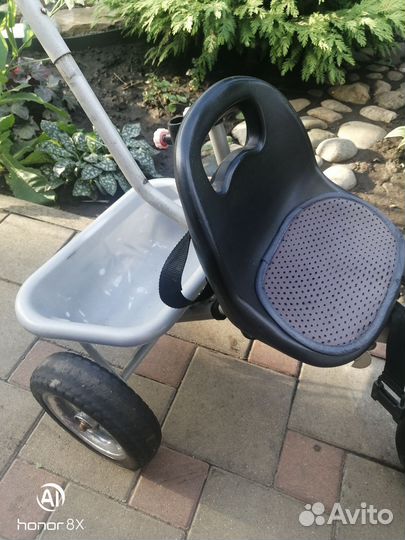 Трехколесный велосипед с ручкой