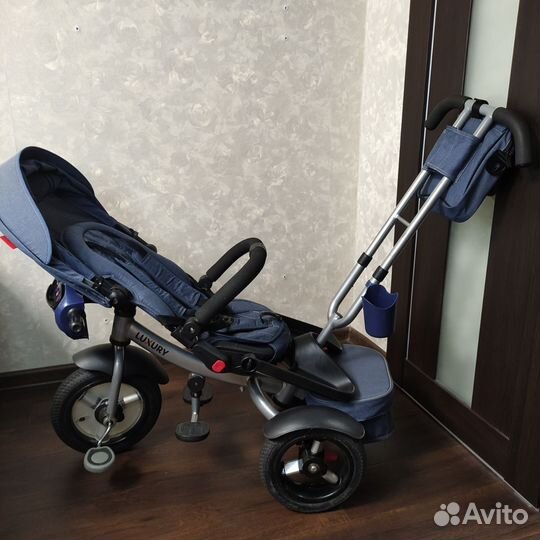 Трёхколёсный велосипед с родительской ручкой