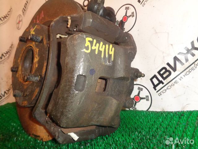 Суппорт nissan WTP12 перед право