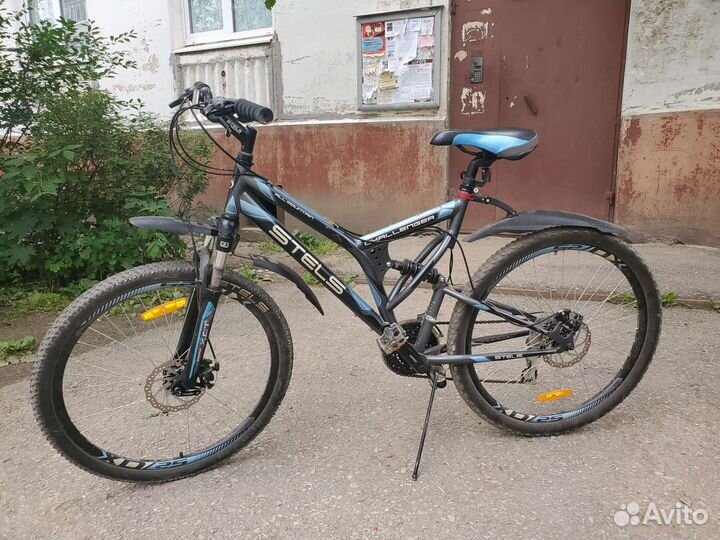 Велосипед горный двухподвесный