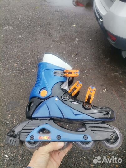 Роликовые коньки