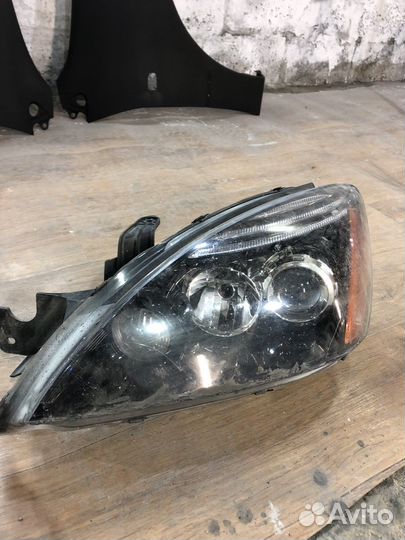 Фара mitsubishi lancer 9