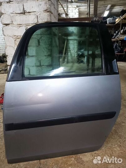 Дверь задняя левая Skoda Roomster