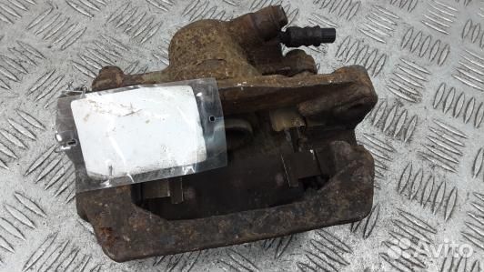 Суппорт тормозной задний левый subaru forester 3