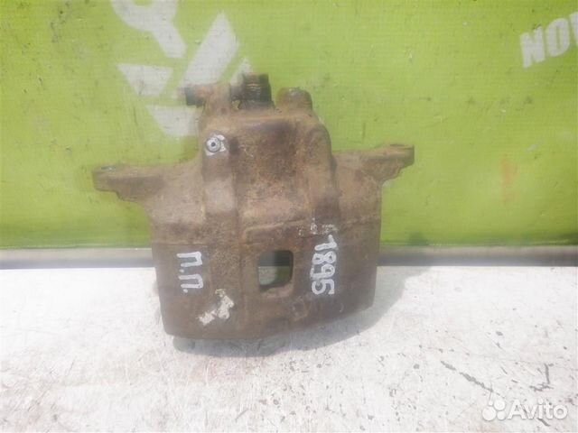 Суппорт передний правый Митсубиси Галант 9