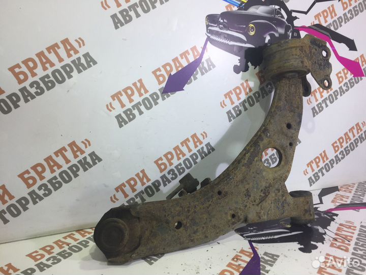Мазда сх-7 Рычаг передний левый