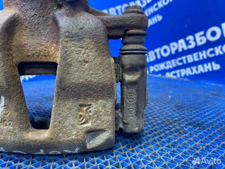 Передний левый суппорт Opel Corsa D хэтчбек Z12XEP