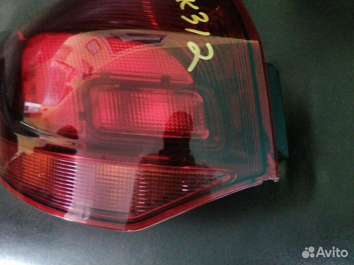 Фонарь левый Opel Astra J универсал 2013