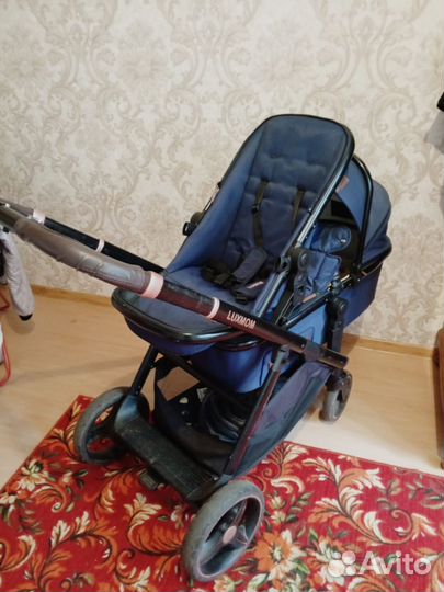 Коляска для погодок