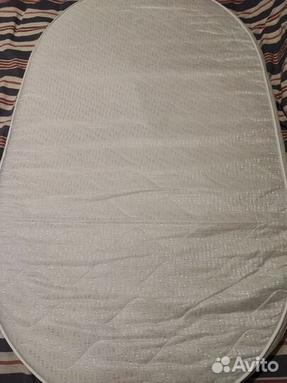 Детская овальная кроватка с маятником