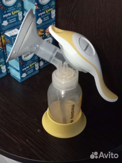 Молокоотсос medela ручной