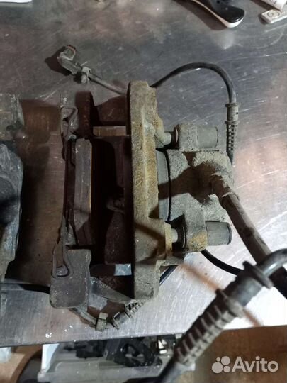 Суппорты передние Mercedes W210