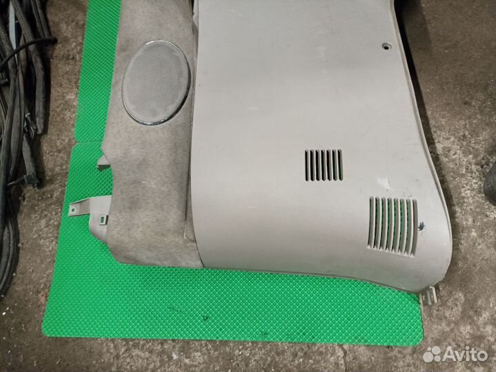 Обшивка багажника правая Kia Carnival 2002-2006