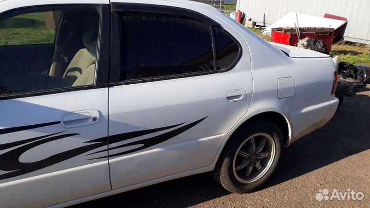 Дверь левая задняя тойота камри cv40