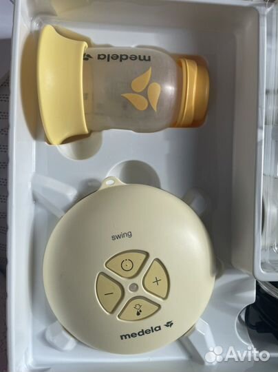 Молокоотсос medela электрический
