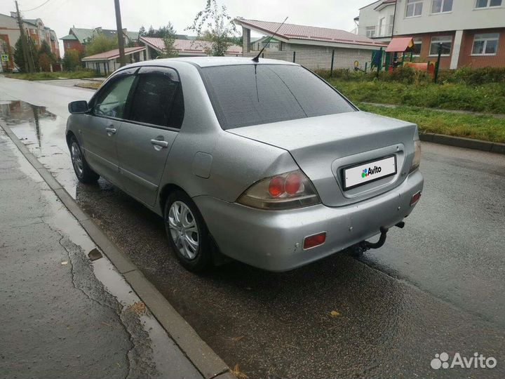 Mitsubishi Lancer 1.6 AT, 2004, 383 969 км