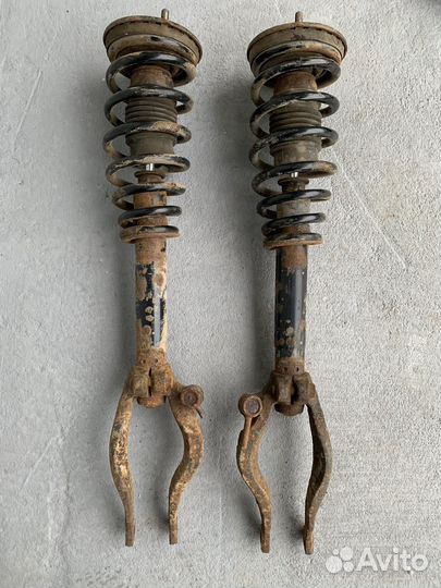 Стойка амортизатора передняя Mitsubishi Galant 7