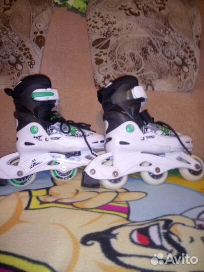 Роликовые коньки