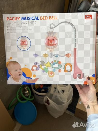 Детский мобиль в кроватку музыкальный