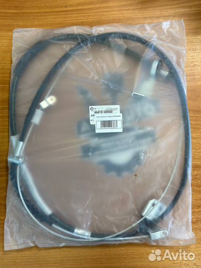 Трос стояночного тормоза 46410-60560 LC80