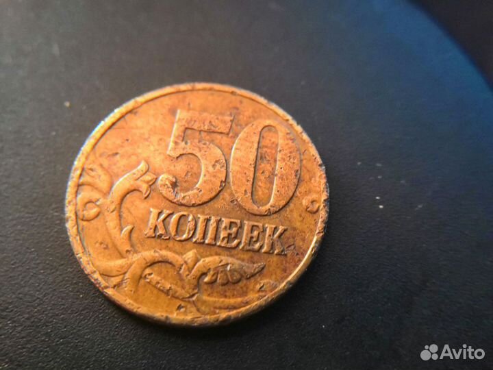 Монета