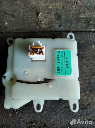 Моторчик заслонки отопителя Форд Мондео 2