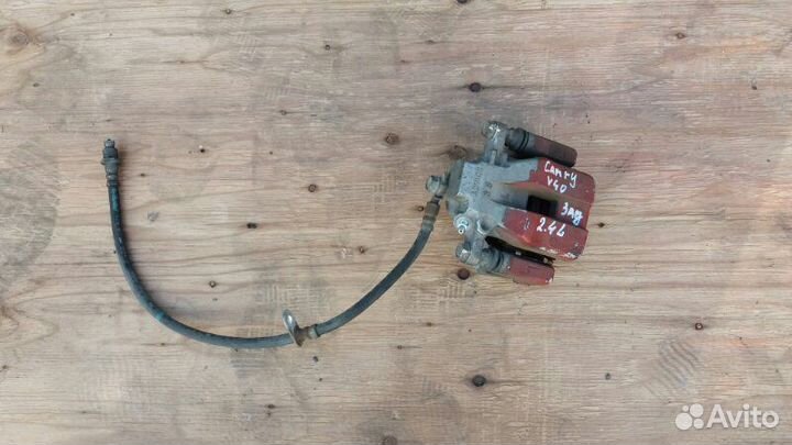 Суппорт тормозной левый Toyota Camry V40 2006-2011