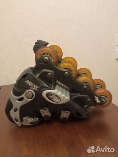 Роликовые коньки