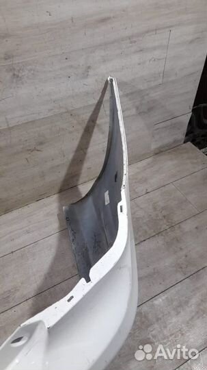 Бампер задний под парктроники Toyota Corolla E 150