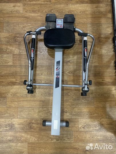 Гребной тренажер