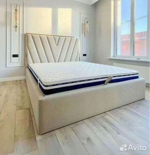 Кровать с подъемным механизмом