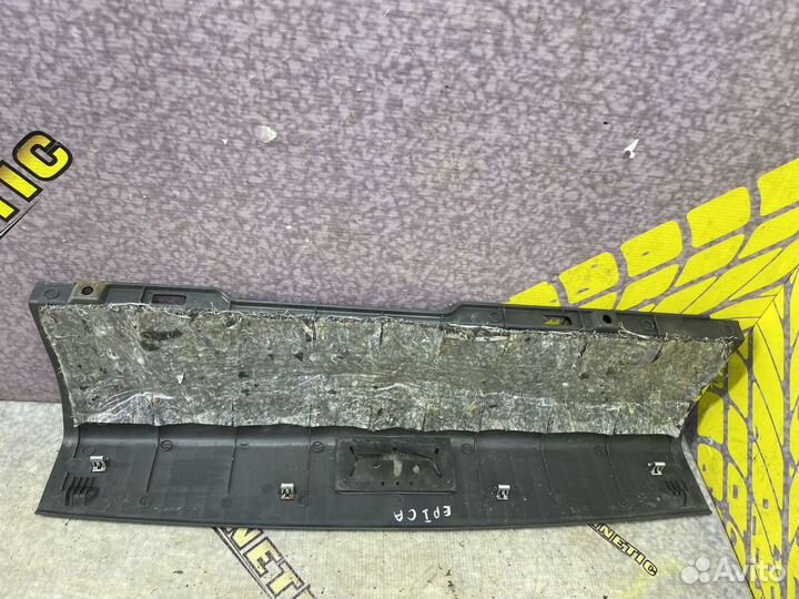 Обшивка задней панели багажника Эпика Epica V250