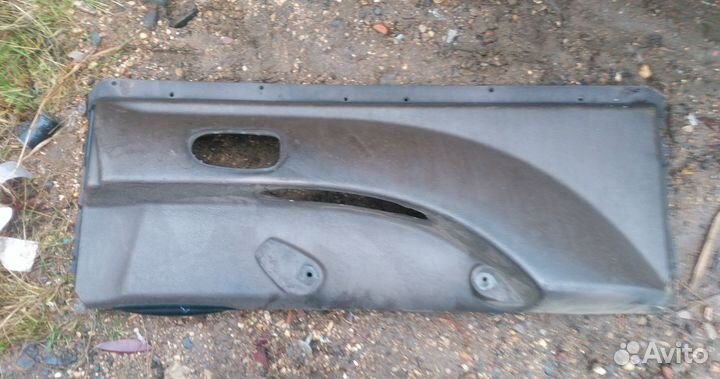 Обшивка двери левая Renault Magnum