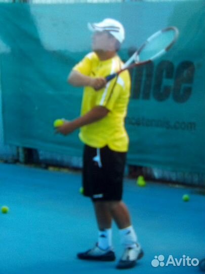 Тренер по теннису