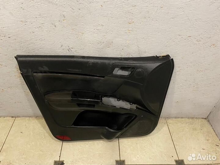 Обшивка двери передняя левая Geely Emgrand EC7