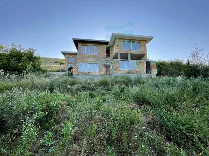 Дом 410 м² на участке 19 сот.