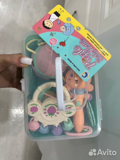 Погримушки и грызунки в контейнере новые