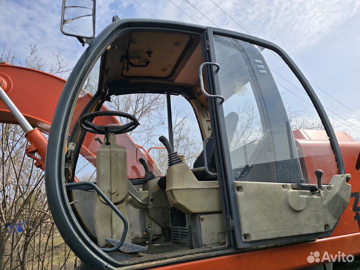 Колёсный экскаватор Твэкс ЕК-12, 2011