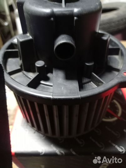 Моторчик отопителя Киа spectra