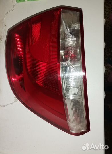Фонарь задний левый б/у на Поло седан. Оригинал