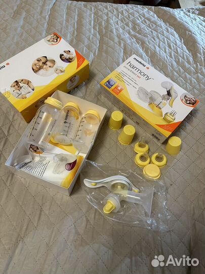 Ручной молокоотсос Медела и бутылочки