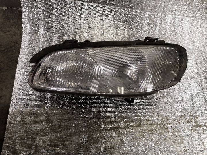 Фара передняя левая opel omega