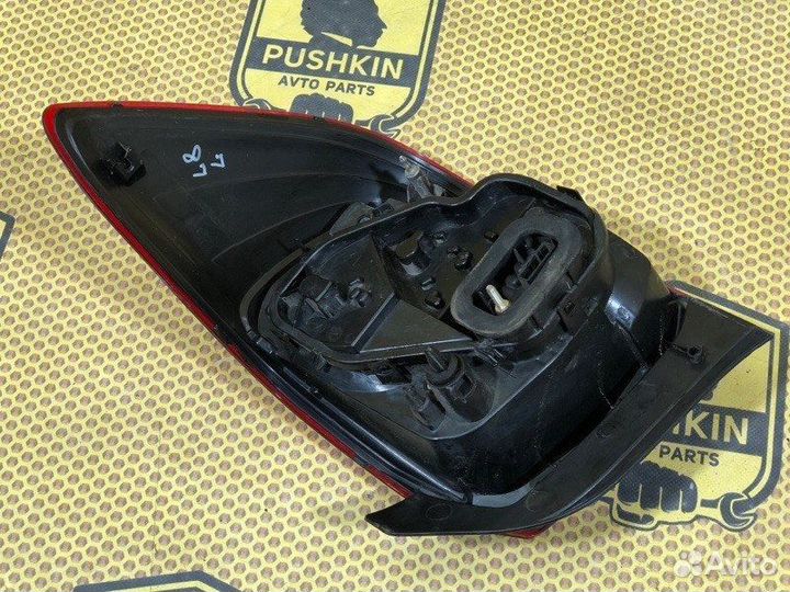 Фонарь в крыло задний левый Renault Logan L8 K7M