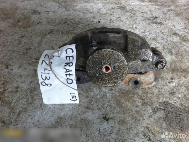 Суппорт передний правый Kia Cerato 2009-2013