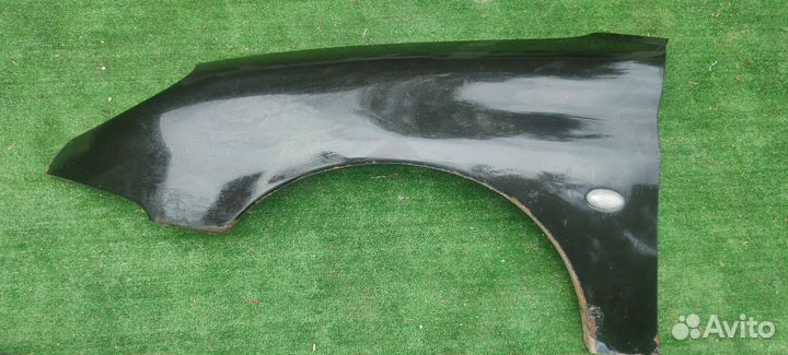 Крыло левое Peugeot 206