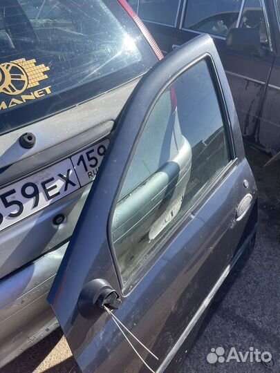 Дверь передняя левая renault logan 1
