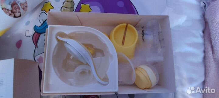 Молокоотсос medela