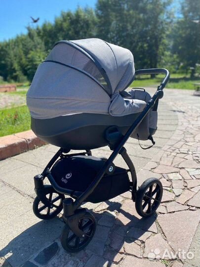 Коляска Tutis Nanni 2в1серый /т.серый кожа/чер.рам